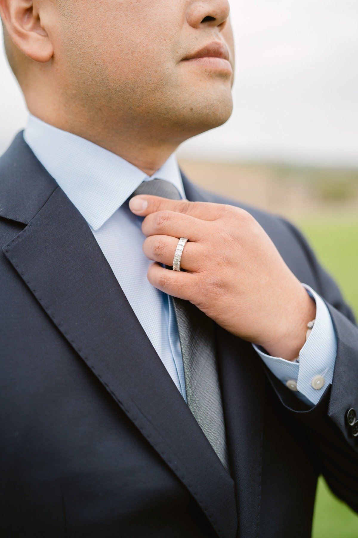 Blingy diamond groom's ring